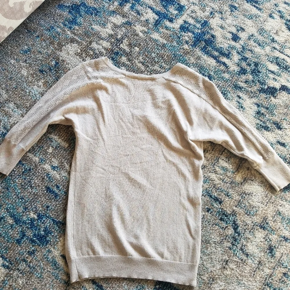 The limited V Neck 3/4 sleeve Light weight sweater size XS